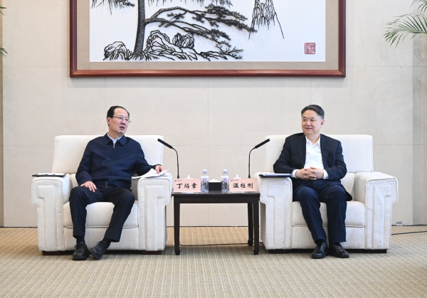 丁焰章與中國華能董事長、黨組書記溫樞剛會談